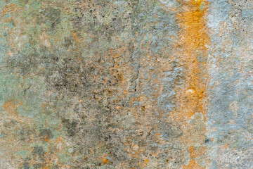 old concrete wall grunge texture background with orange stains