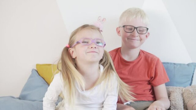 The average plan of cute kids with glasses. Funny kids with glasses build faces