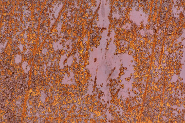 Old metal surface close up. Paint and rust. Corrosion