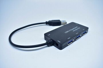 hub 4 port usb 3.0 superspeed black 5 volt power with white background