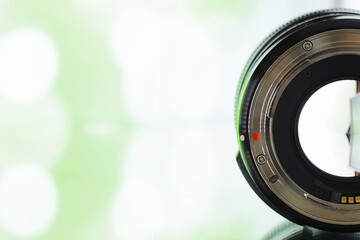 Equipment videographer and photographer. Lenses on the table against the background of bright...