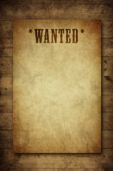 wanted poster on wooden background