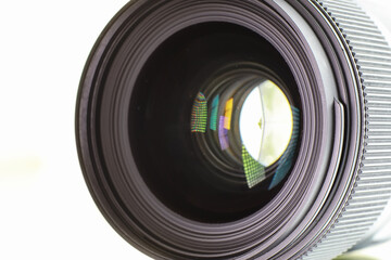 Equipment videographer and photographer. Lenses on the table against the background of bright...