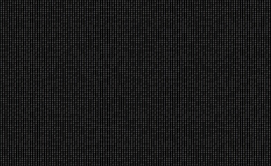 Random pattern of black and white binary code with ones and zeros on a terminal screen