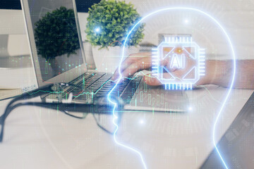 Man with computer background with brain theme hologram. Concept of brainstorm. Double exposure.