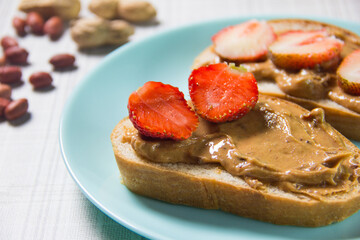 peanut butter and strawberry sandwiches. Peanut butter and strawberry jelly sandwich