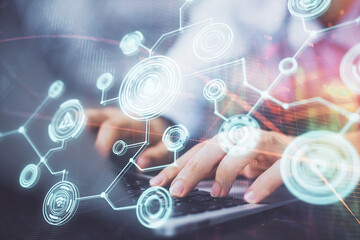 Media network theme hologram with man working on computer on background. Concept of internet communication. Double exposure.