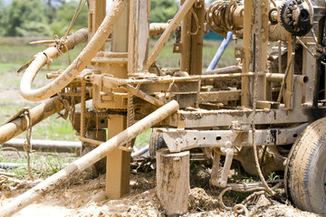 ground drilling water machine on the old truck drilling in the ground for water