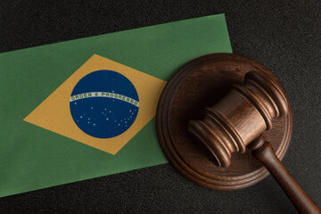 Judge or auction gavel on background of flag of Brazil. Constitutional human rights. Legality...