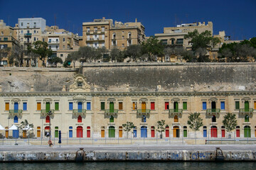 Old houses with Colourful Doors in Valetta seen from the Harbour
