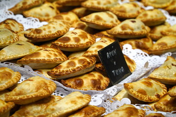Traditional snack with tuna. An empanada is a type of pastry baked or fried in Hispanic cultures. Mix set empanadas (veg and meat) La Boqueria is the most famous market in Barcelona worldwide. 