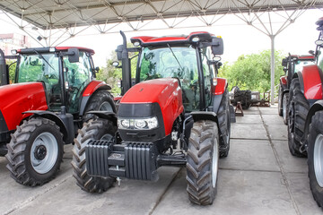 The colorful tractors in the road