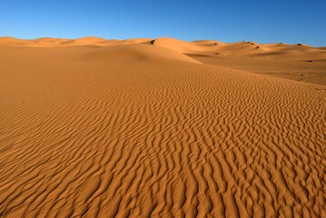 SAHARA DESERT SAND DUNES IN TASSILI NATIONAL PARK IN ALGERIA