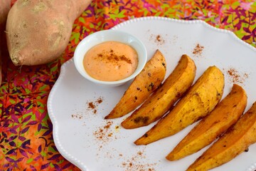 Sweet potato fries with mayonnaise and ketchup