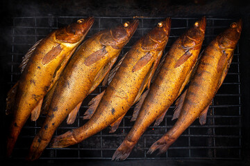 .The process of making smoked fish. Perch.