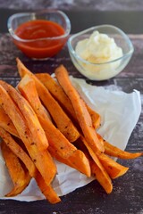 Sweet potato fries with mayonnaise and ketchup