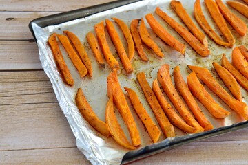 Sweet potato fries on baking sheet