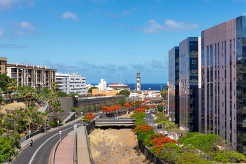 Partial view of the city from Puente Galceran towards harbor, maritime area, Iglesia de la Conception and residential and office buildings, Santa Cruz de Tenerife, Canary Islands, Spain