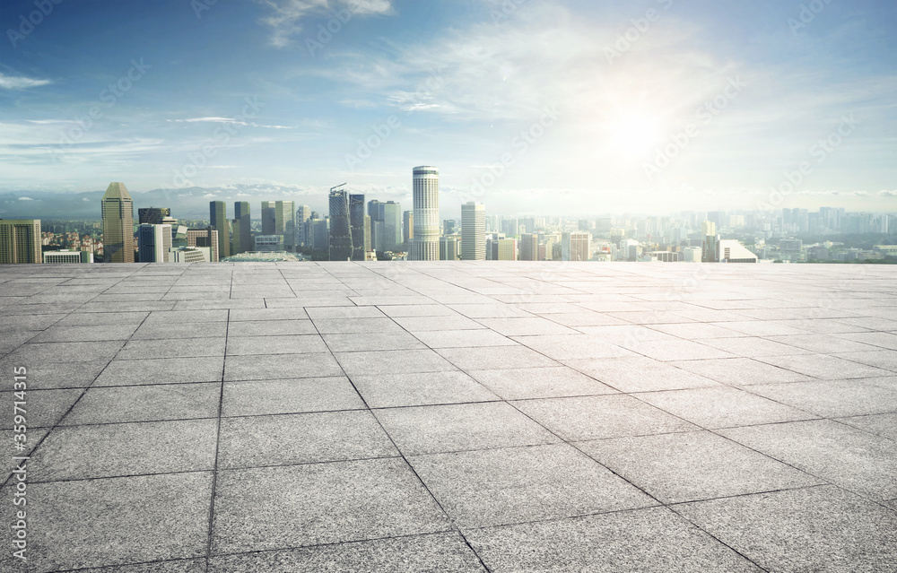 Wall mural Wide empty concrete floor with  cityscape view