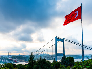 View of the Istanbul Bosphorus from Otagtepe. Fatih Sultan Mehmet Bridge with Turkish Flag....