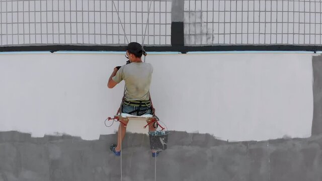 Industrial Climber Painting Building Facade Wall, Insulation Work, Aerial View
