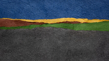 blue sky and dark fields - colorful landscape abstract created with sheets of handmade textured paper