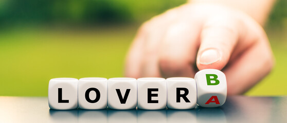 Symbol for choosing a different lover. Hand turns dice and changes the expression "Lover A" to "Lover B".