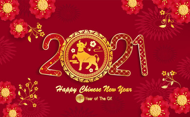 Chinese new year 2021 year of the ox on red paper cut ox character flower and asian elements with craft style on background.(Chinese translation : Happy chinese new year 2021)