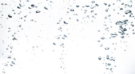 Air bubbles water float up on a white background.