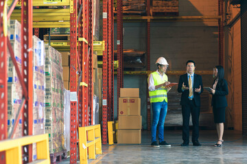 Asian business man, woman and engineer wear protective face shield in warehouse 