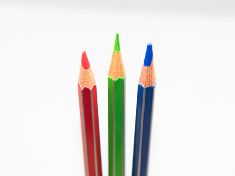 Red, Green and Blue, the three primary colours, RGB coloured pencil isolated on white background.