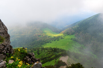 Mountain forest landscape under evening sky with clouds in sunlight. Little Fatra, Slovakia Big Rozsutec