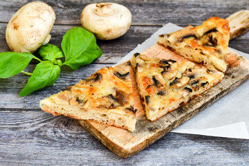  Mushroom italian  roman  style pizza.   Parmesan cheese,  cream, olives , , garlic, mushrooms,  tomato sauce 