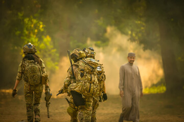 	
Team special forces. soldier assault rifle with silencer. sniper in the forest.