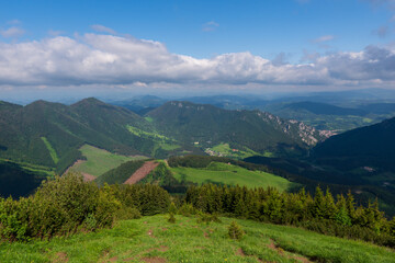 Fototapeta na wymiar Mountain green valley village landscape. Mountain valley town panorama