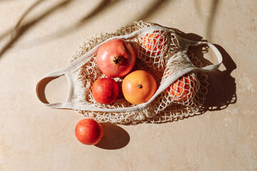 Fresh fruits in eco friendly mesh shopping bag