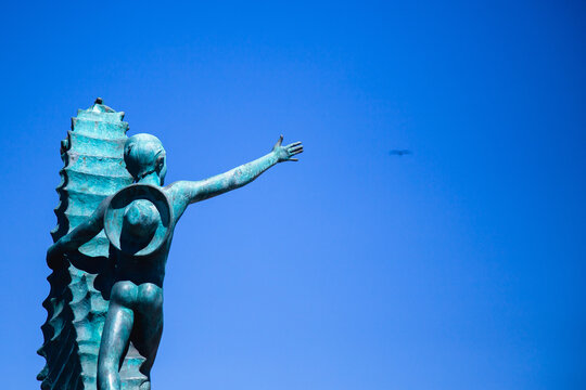 Boy In A Hat Statue Climbing A Cactus In México City Of Puerto Vallarta 