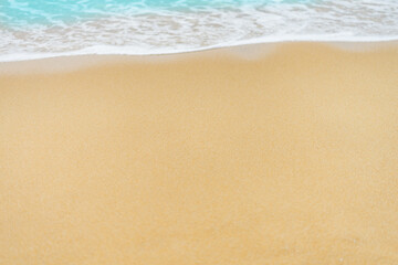 close up sand beach with blue sea wave background