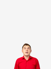 Fototapeta premium Promotional background. Special offer. Amazed man in red shirt isolated on white copy space.