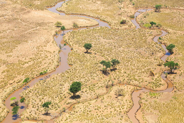 Aerial view of the Brown River in the Shompole conservancy area in the Great Rift Valley, near Lake Magadi, Kenya.