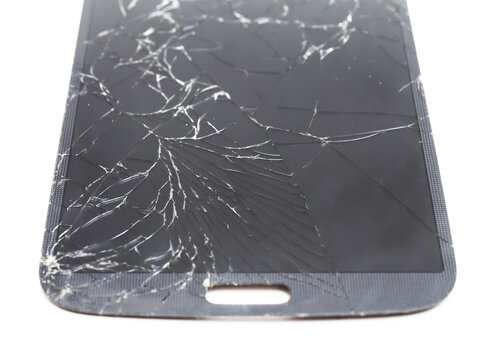 Mobile smartphone with broken glass lcd touch screen on white background.