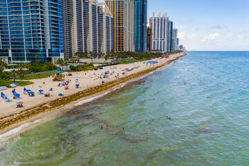 Miami Beaches reopening during Coronavirus Covid 19 pandemic social distancing restrictions