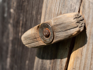 wooden manmade heck on an old door