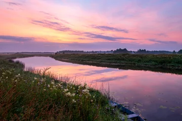 Gordijnen Summer pink sunrise over the river. Calm, relaxing rural landscape. © Zadvornov