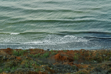 Top view from cliff to the seaside. Amazing nature