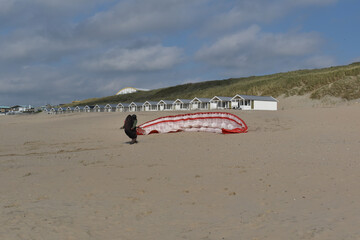 Paragliding at the beach of Katwijk aan Zee. Paraglider's making use of updraft of the dunes to stay in the air 