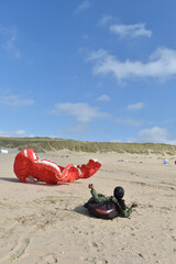 Paragliding at the beach of Katwijk aan Zee. Paraglider's making use of updraft of the dunes to stay in the air 