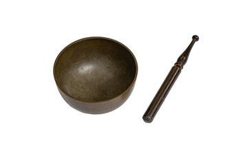 A golden Tibetan bowl with a metal stick sitting isolated on white background.