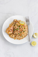 Vertical Photo of Mediterranean Chicken Rice on WHite Background Top Down Photo