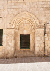 Old buildings on Shaar Shalshelet Street in the Arab Quarter in the old city of Jerusalem, Israel